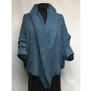 Lucie Bournival blue cape shawl sweater On…
